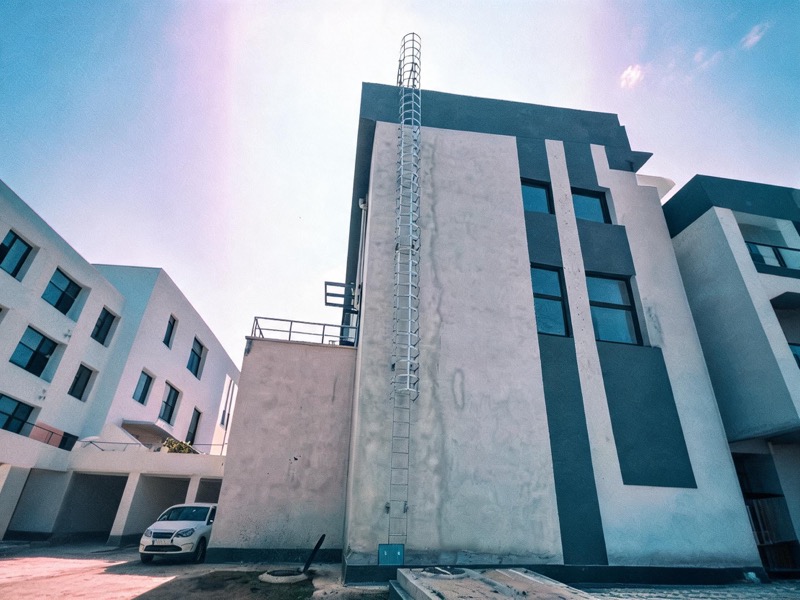 Walk-through cage ladder installed
