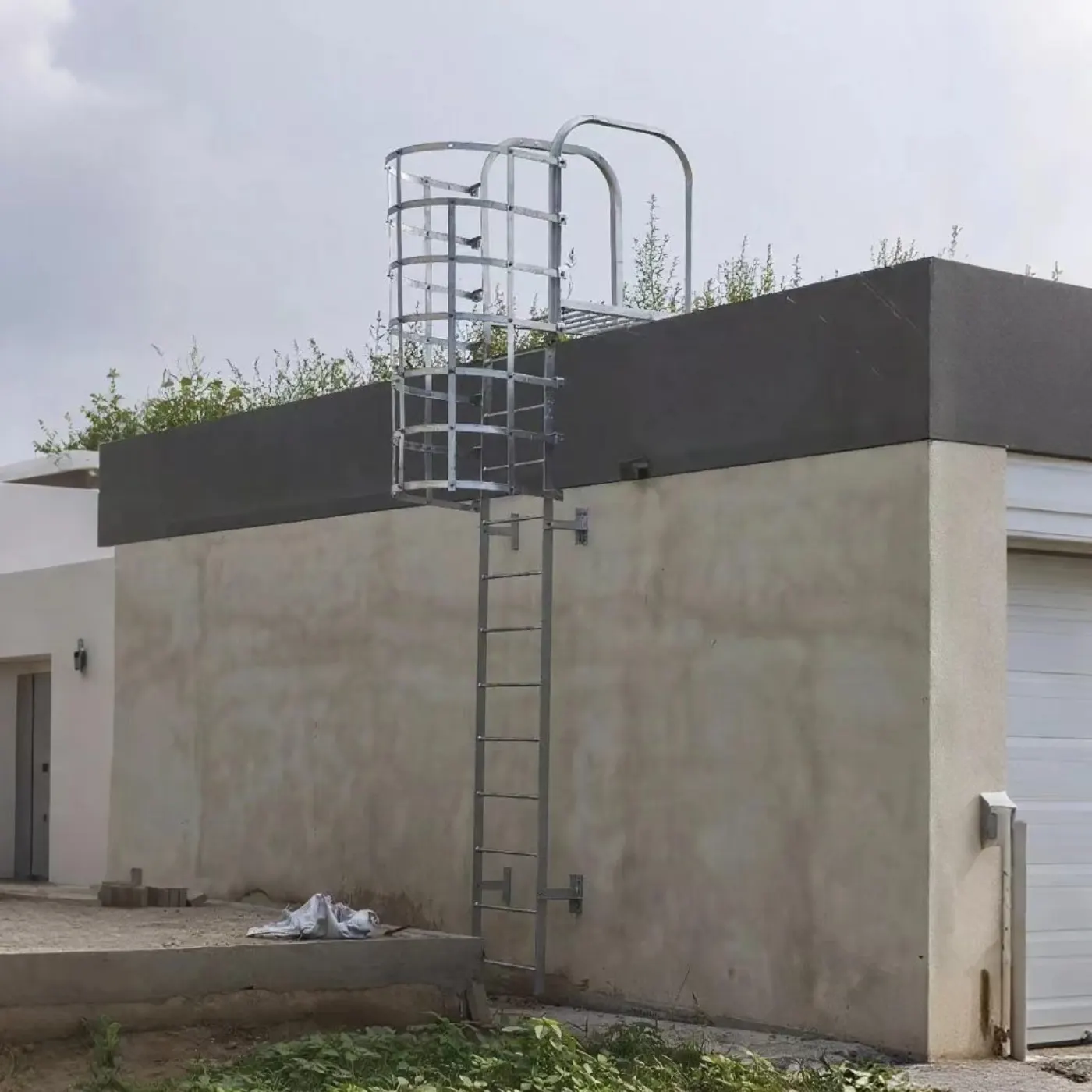 Self-closing safety gate installed at cage ladder exit